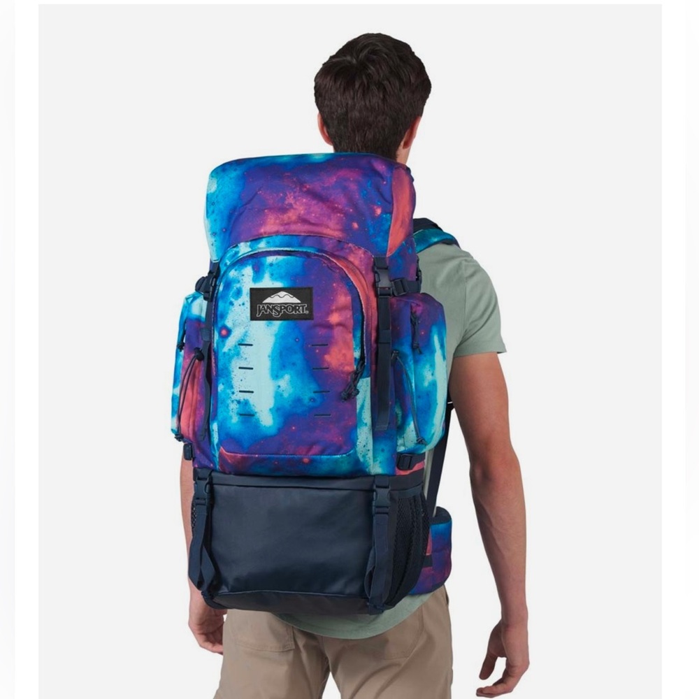 Jansport Far Out 55 Travel Back Pack. Carry on approved. NWT Outer Space Pattern